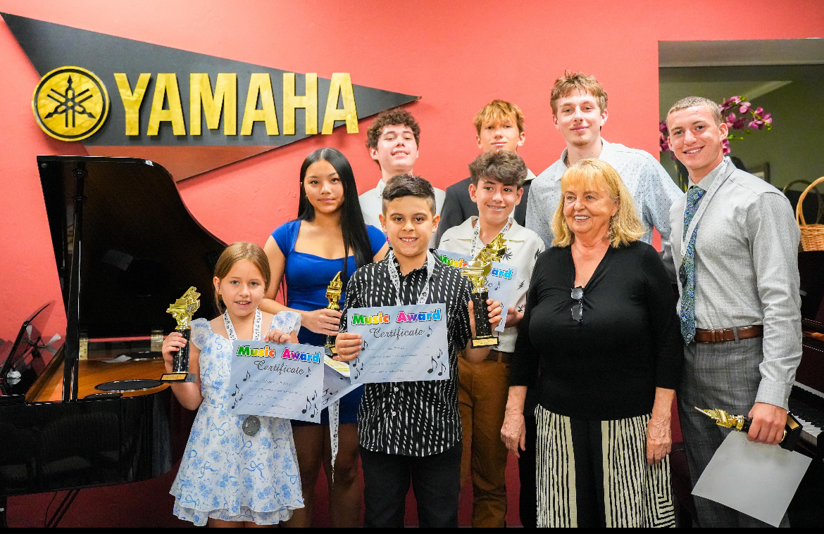 Larissa with award-winning piano students